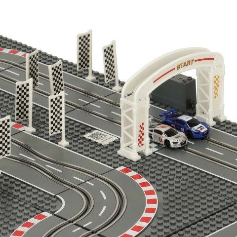 Tor wyścigowy samochodowy elektryczny policyjny 2 auta autka kontrolery zakręty klocki konstrukcyjne GD-02